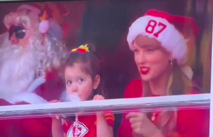 Taylor Swift wears Santa hat with Travis Kelce’s number on it